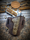 Buffalo 1911 holster with rattlesnake inlay.