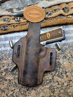 Buffalo 1911 holster with rattlesnake inlay.