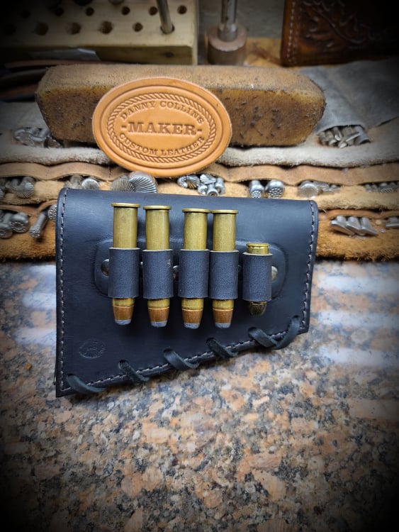 Black Buffalo buttstock ammo/cartridge sleeve with rattlesnake inlay.