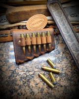 Buffalo buttstock ammo/cartridge sleeve with rattlesnake inlay.